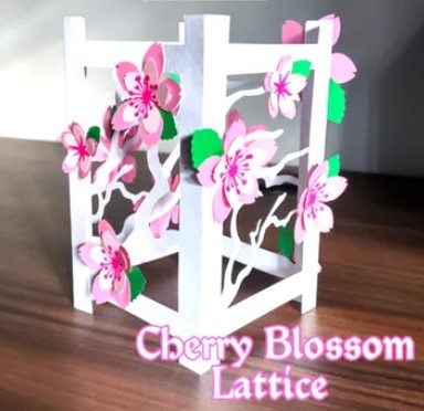 cherry blossoms on a white lattice container