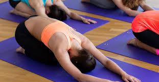 stretching on yoga mat